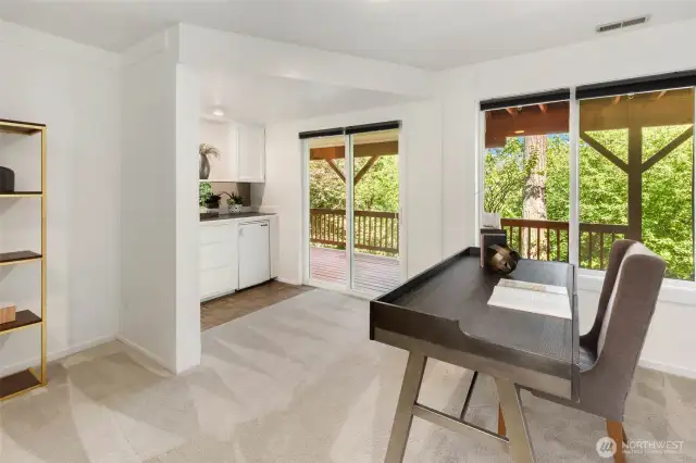 Office with coffee nook and access to lower level back deck.