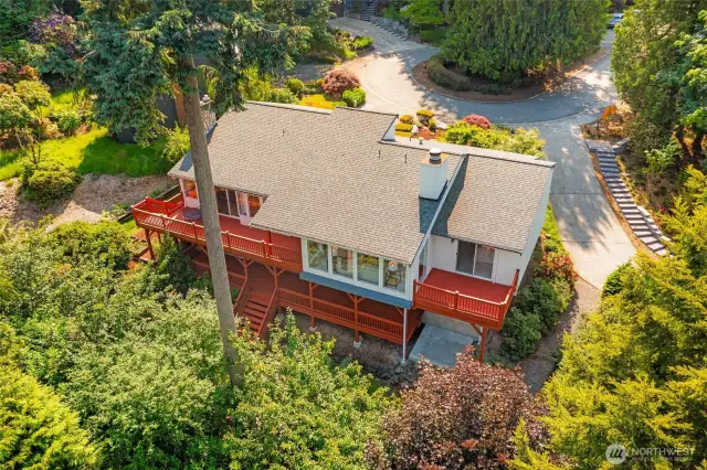 Amazing privacy backing up to nature with small view of Lake Sammamish.