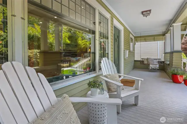 Inviting front porch offers the perfect spot to welcome guests and enjoy the rhythm of the neighborhood.