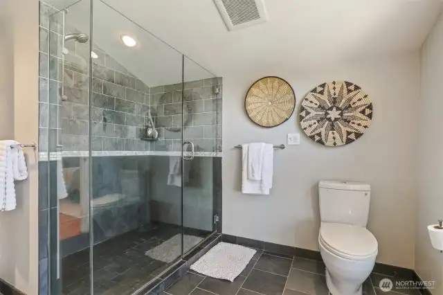 Completely updated with a spacious walk-in shower and heated floors.
