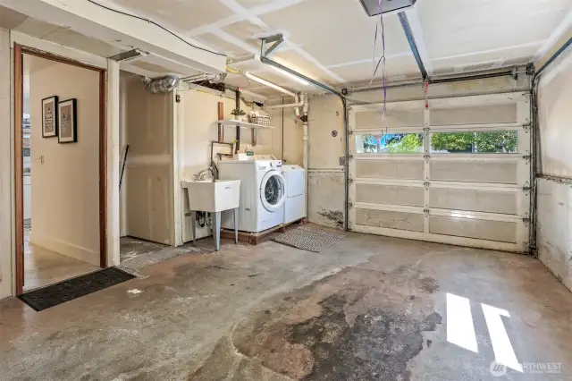 Enjoy the ease of an attached garage—perfect for dry parking and effortless unloading. Entrance to finished guest suite from here.
