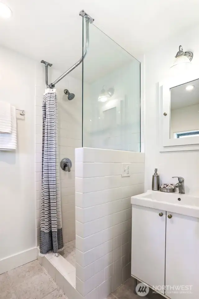 Three quarter bathroom in the guest suite.