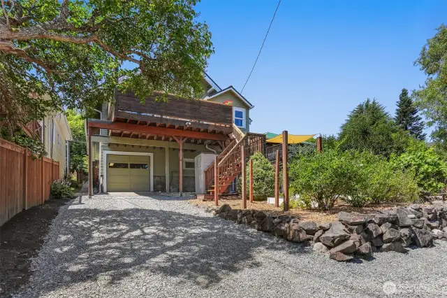 Alley access to the attached one car garage and ample off-street parking.
