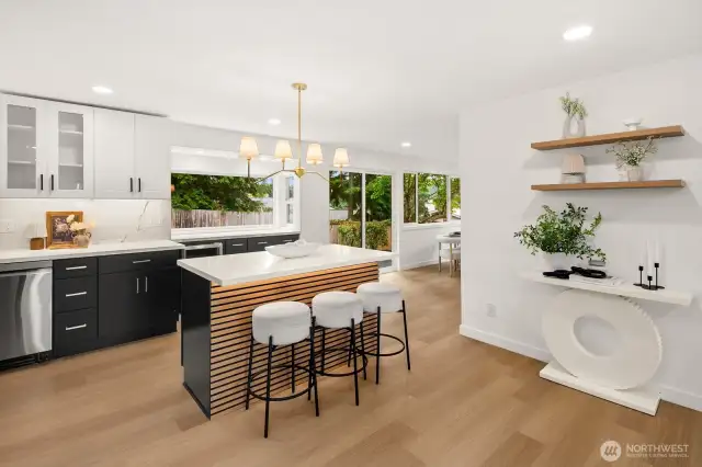 Open concept kitchen, opens to both living and family rooms.