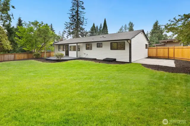 Large fenced back yard, lawn has been enhanced.
