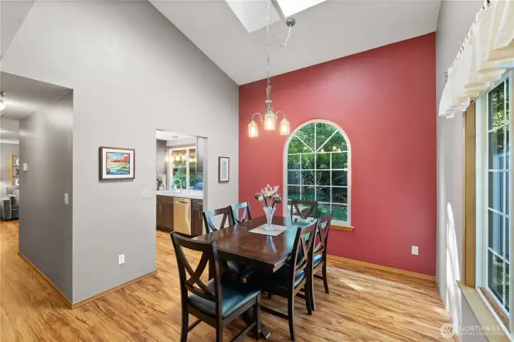 Dining room is large enough for your big table and a crowd around it.