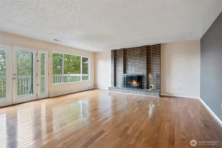 Nice size Livingroom with acces to the deck with views of Dyes Inlet and Cascade Mountains.