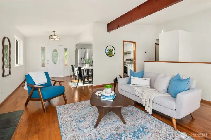 This is the main floor.  The stairway behind the half wall takes you to the mid-split door and the lower level.