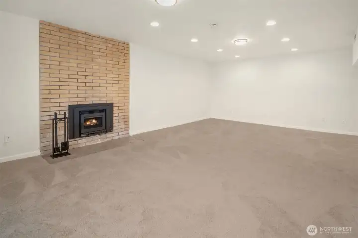 The bonus is large with fresh paint and new carpet.  The carpet is actually more creamy than this photo portrays.