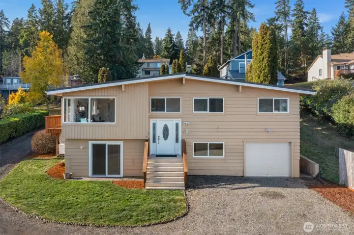 The lower drive with a one car garage.