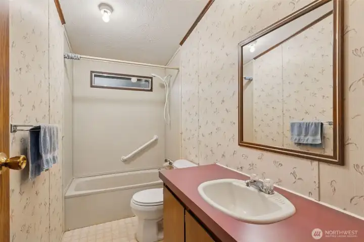 Full bathroom off of two additional bedrooms with tub/shower combo.