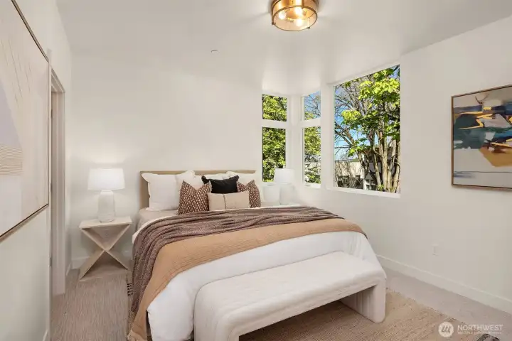 Photos from model home. Primary bedroom suite on third floor