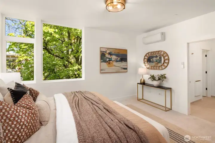 Photos from model home. Primary bedroom suite on third floor