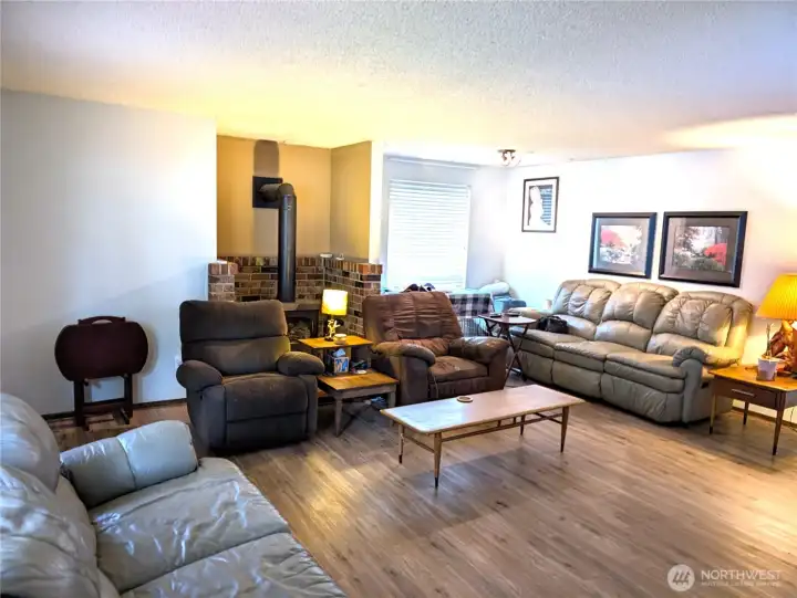 Another angle of the family room w/ample seating.