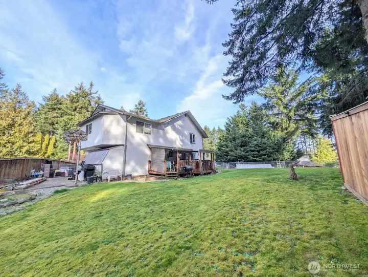 Storage & sport court to the left.  Nice covered deck.