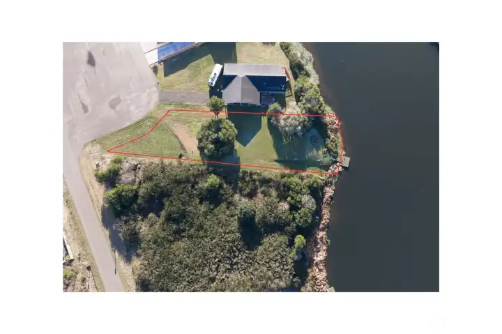 Waterfront lot is located on a quiet culdesac. (Lot lines are approximate. Buyer to verify)