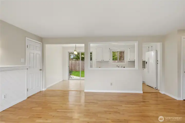 Open flow from living area to kitchen and dining with easy access to the patio and backyard.