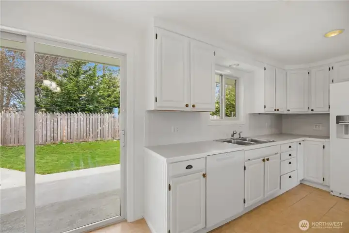 Plenty of cabinets and counter space with easy access to the patio and back yard.