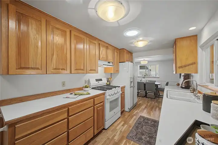 Kitchen with gas range.
