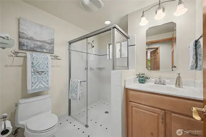 Bathroom with no-step shower.