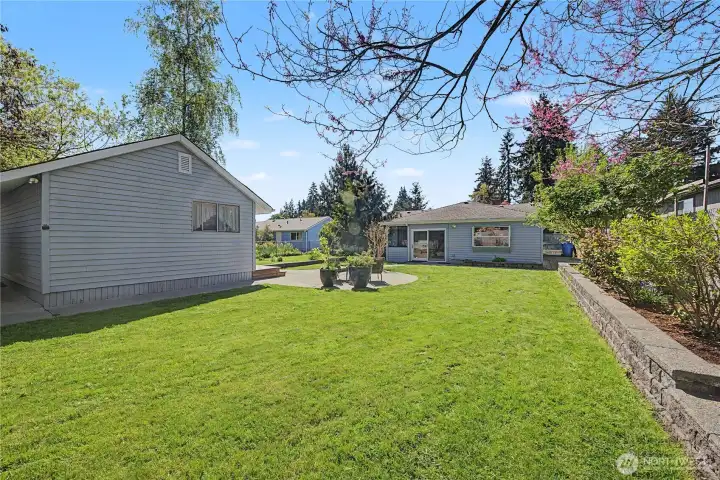 Backyard with gardening space.