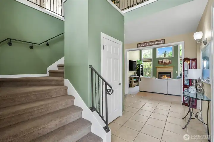 Grand entry with Cathedral ceilings and stunning tile flooring
