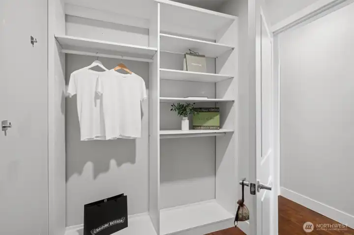 Primary suites walk-in closet. Primary suites walk-in closet.