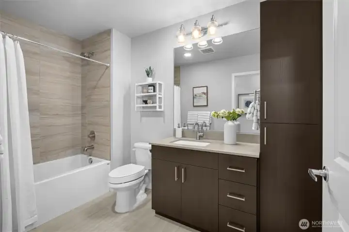 2nd full bathroom with fully tiled shower surround, quartz countertops and a very euro modern feel. 2nd full bathroom with fully tiled shower surround, quartz countertops and a very euro modern feel.
