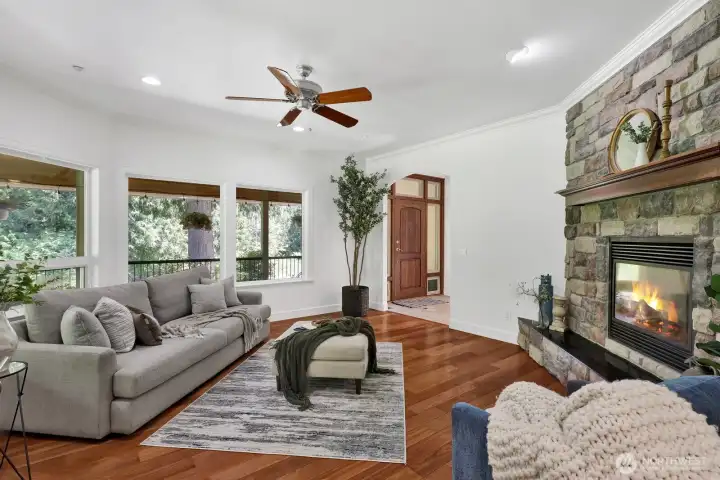 Welcome to the great room with a cozy fireplace Welcome to the great room with a cozy fireplace