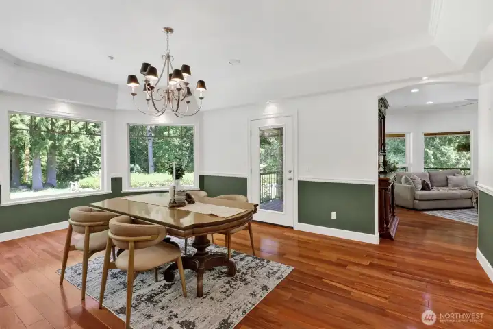 The home flows to a spacious formal dining room with access to the wrap around porch The home flows to a spacious formal dining room with access to the wrap around porch