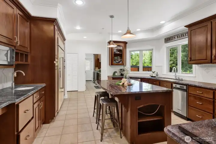 A chef's kitchen with lots of room for cooking A chef's kitchen with lots of room for cooking