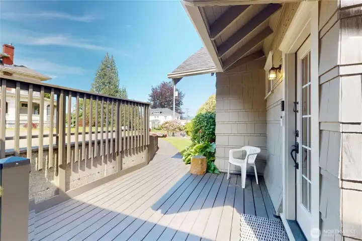 Paved walkway leads to the deck and side entrance into the kitchen. Paved walkway leads to the deck and side entrance into the kitchen.