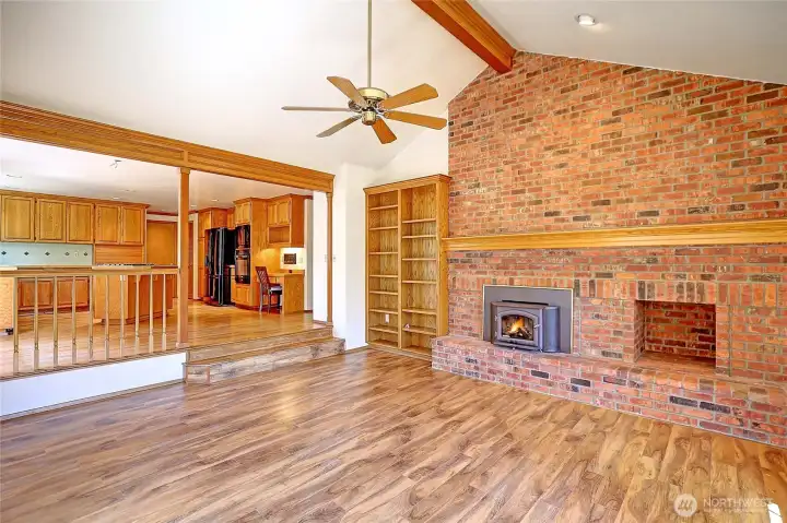 Step down from the large kitchen to the cozy main living area