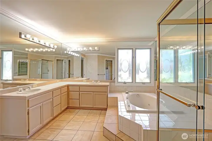 Lots of light and duo vanity with plenty of counter space