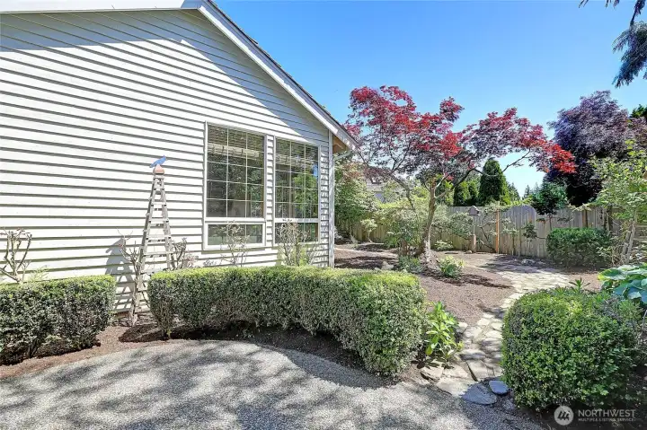 Beautiful boxwood separates the two patios