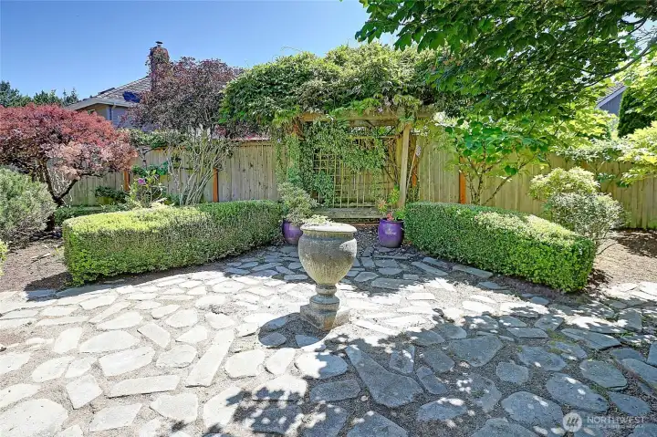 Stone paths lead through the garden to the center of the gardens