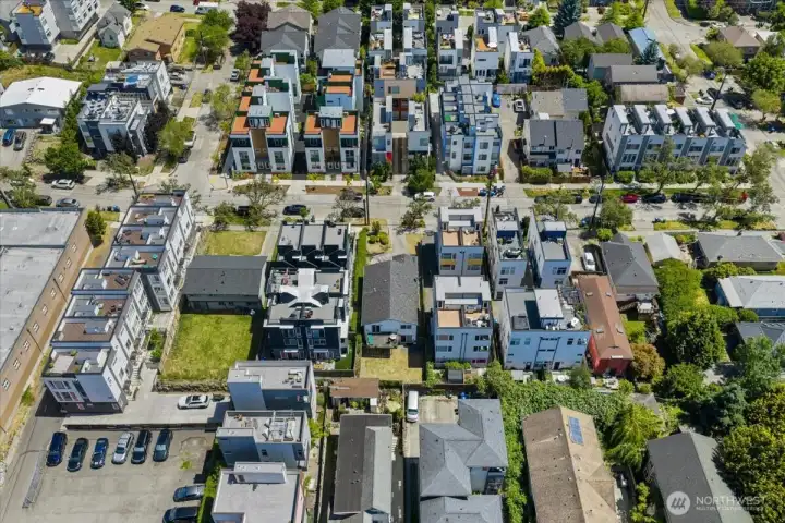 This the 1st wide angle from the drone showing the density of the immediate area.  This is zoned Muti Family.