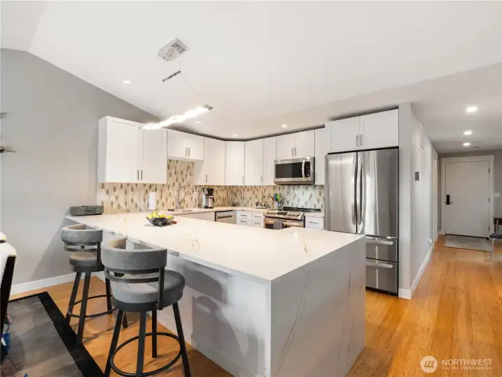 Your guests can belly up to the counter to entertain the cook.