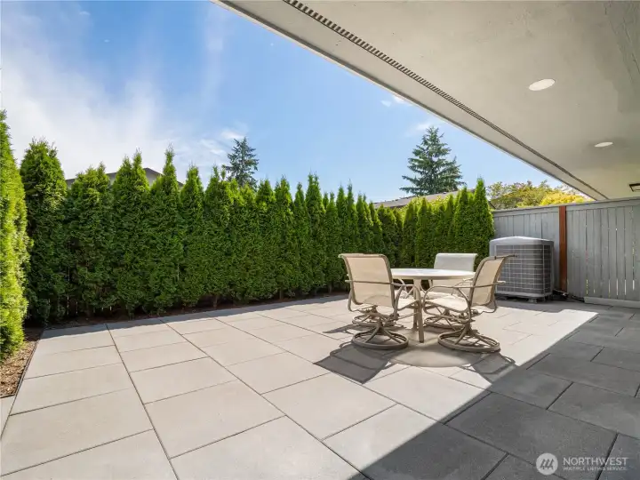 Easy to maintain back yard area that is partially covered when you need to be protected from the elements and not when you want to enjoy the rays.