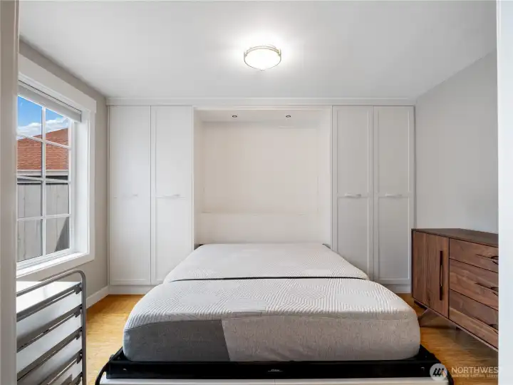 The guest room has a built in murphy beds and lends itself for multiple use.
