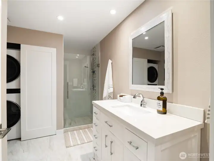 The second bathroom holds the washer and dryer while giving your guests the privacy and comfort they need.