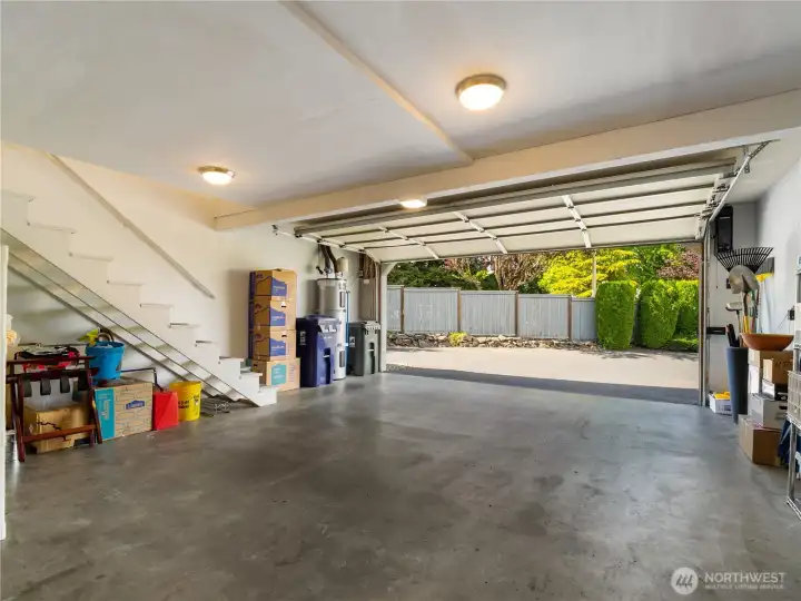The garage holds two cars and have room to store what you need.