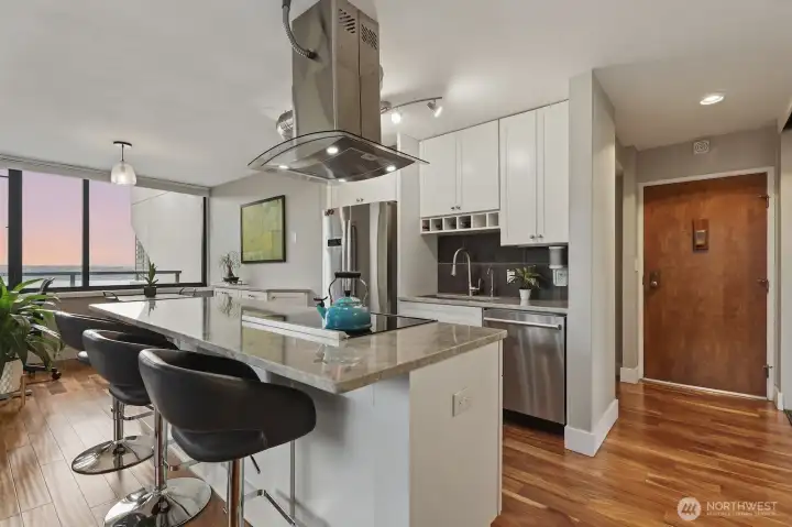Luxe finishes greet you from the moment you step inside - engineered hardwood floors and a remodeled chef's kitchen are sure to please. Luxe finishes greet you from the moment you step inside - engineered hardwood floors and a remodeled chef's kitchen are sure to please.