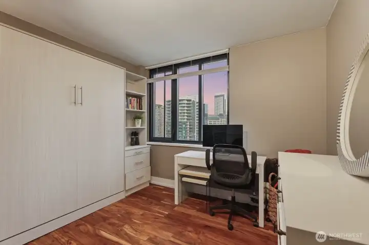 Second bedroom - great for when guests come to stay (with a handy built-in Murphy bed) or as a home office. Second bedroom - great for when guests come to stay (with a handy built-in Murphy bed) or as a home office.
