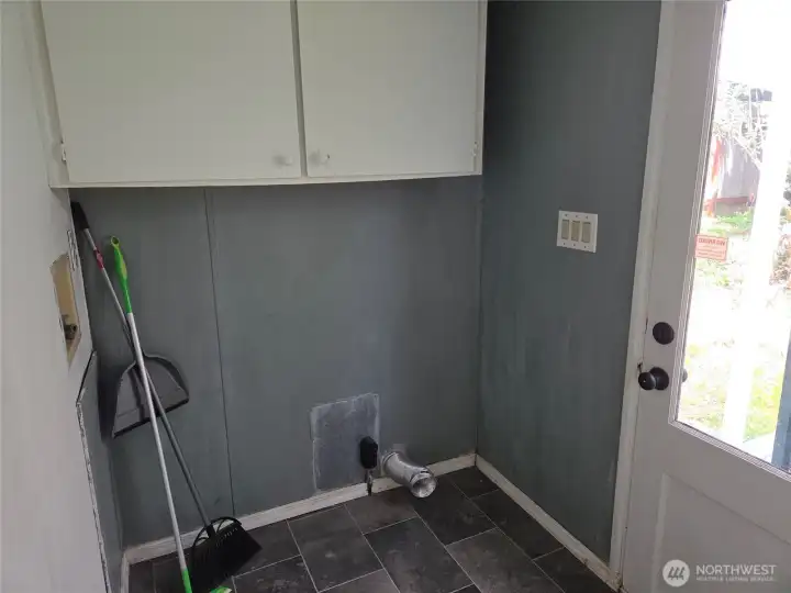 Laundry Room with door accessing the backyard Laundry Room with door accessing the backyard