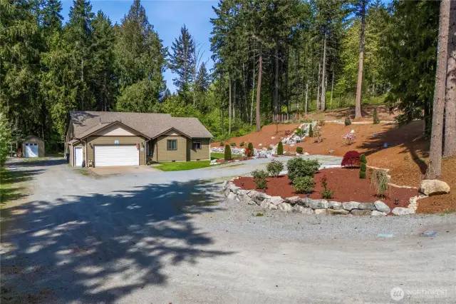 Over and acre of beautifully hardscaped property.