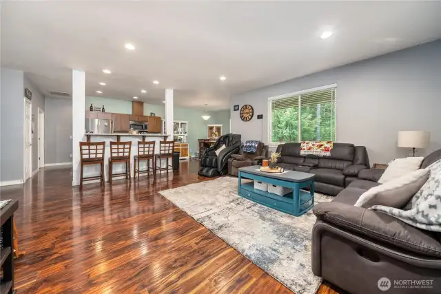 Open concept with large living room, kitchen and dinning area.