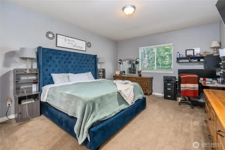 Plenty of room in the primary bedroom.