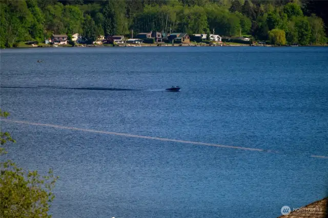 Another view of a boat enjoying the lake!