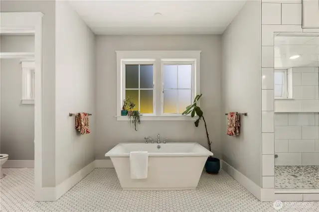 Luxurious spa inspired en suite primary bathroom.